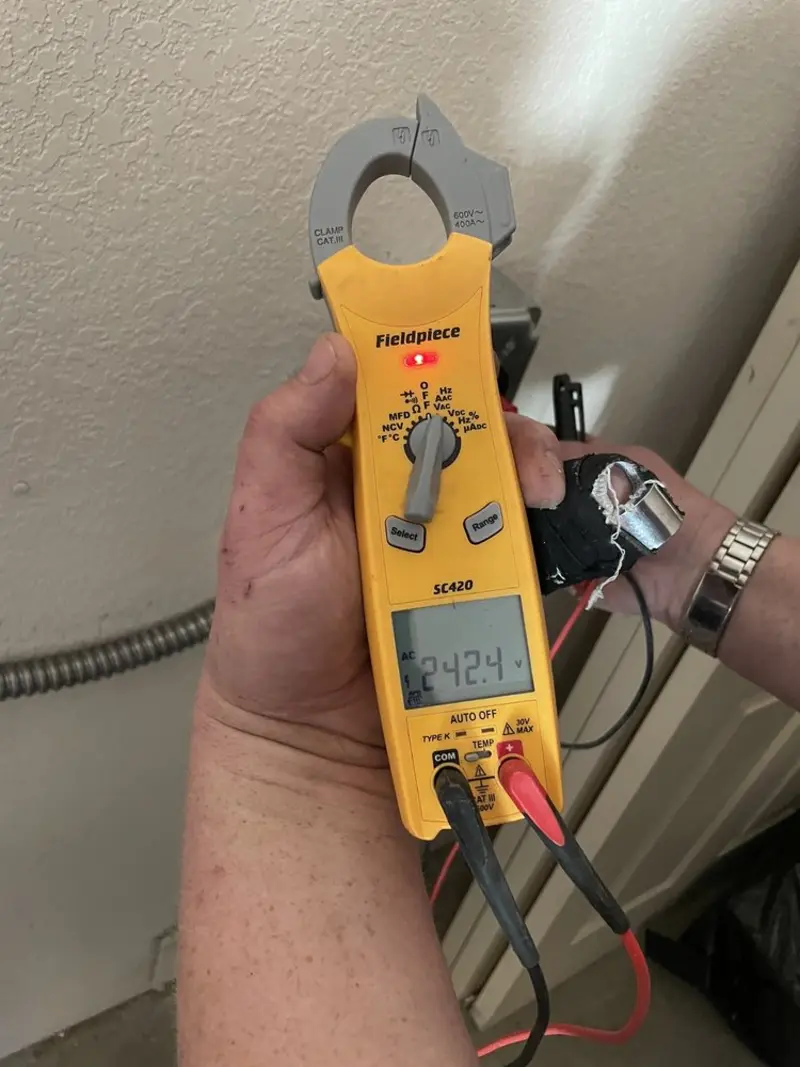 Voltage testing with clamp meter during Hot Tub / Pool Electrical Wiring in Anoka